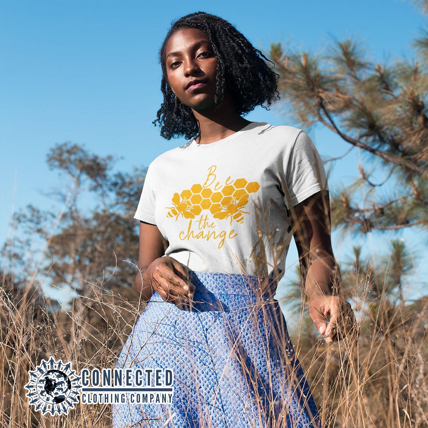 Model Wearing White Organic Cotton Bee The Change Short-Sleeve Tee - Connected Clothing Company - Ethically and Sustainably Made - 10% of profits donated to the Honeybee Conservancy