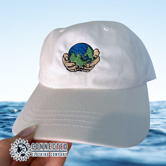 World In Our Hands Embroidered Hat - Connected Clothing Company - 10% donated to ocean conservation