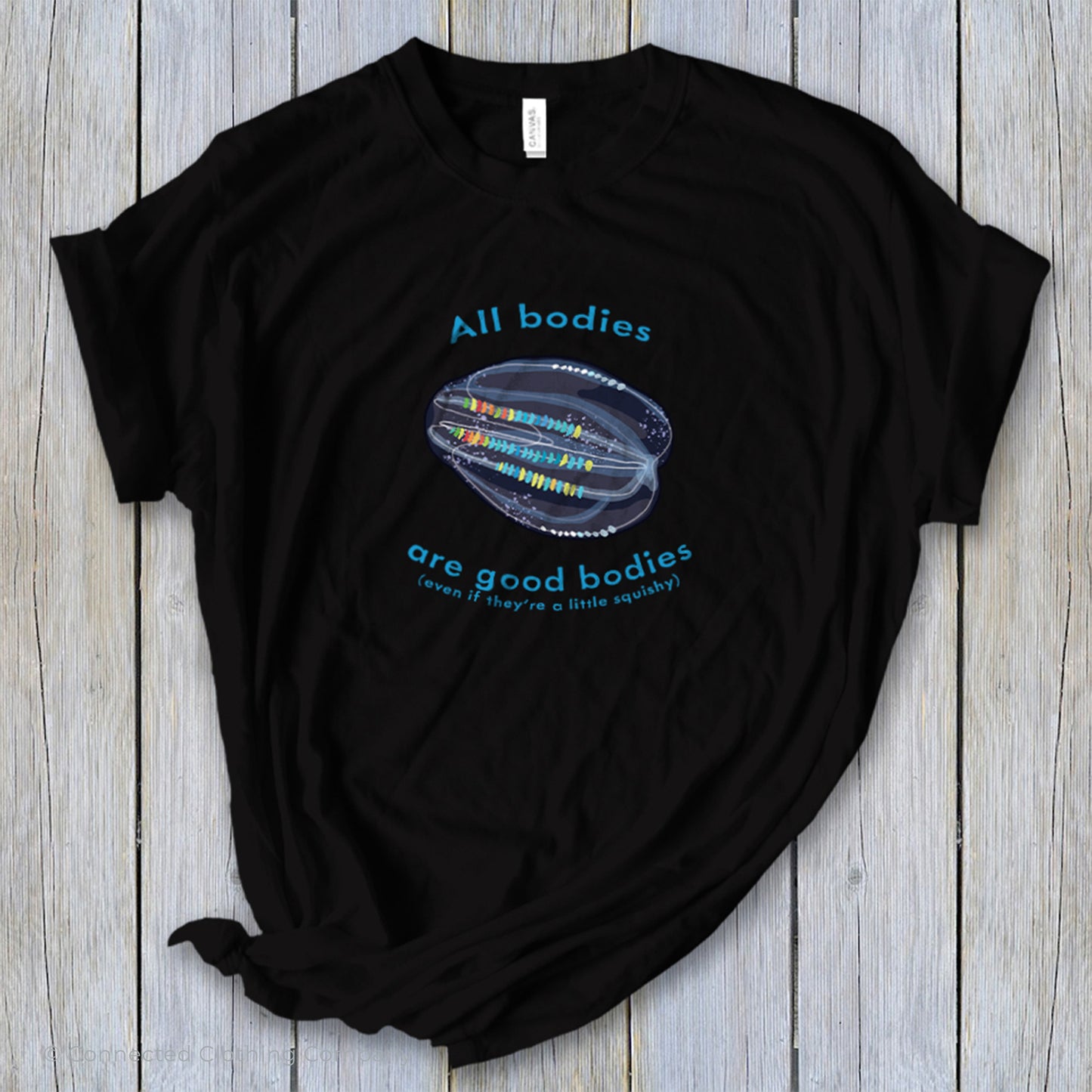 Black All Bodies Are Good Bodies Tee reads "All bodies are good bodies (even if they're a little squishy)." and has a comb jelly ctenophore illustration - Connected Clothing Company - Ethically and Sustainably Made - 10% donated to Mission Blue ocean conservation