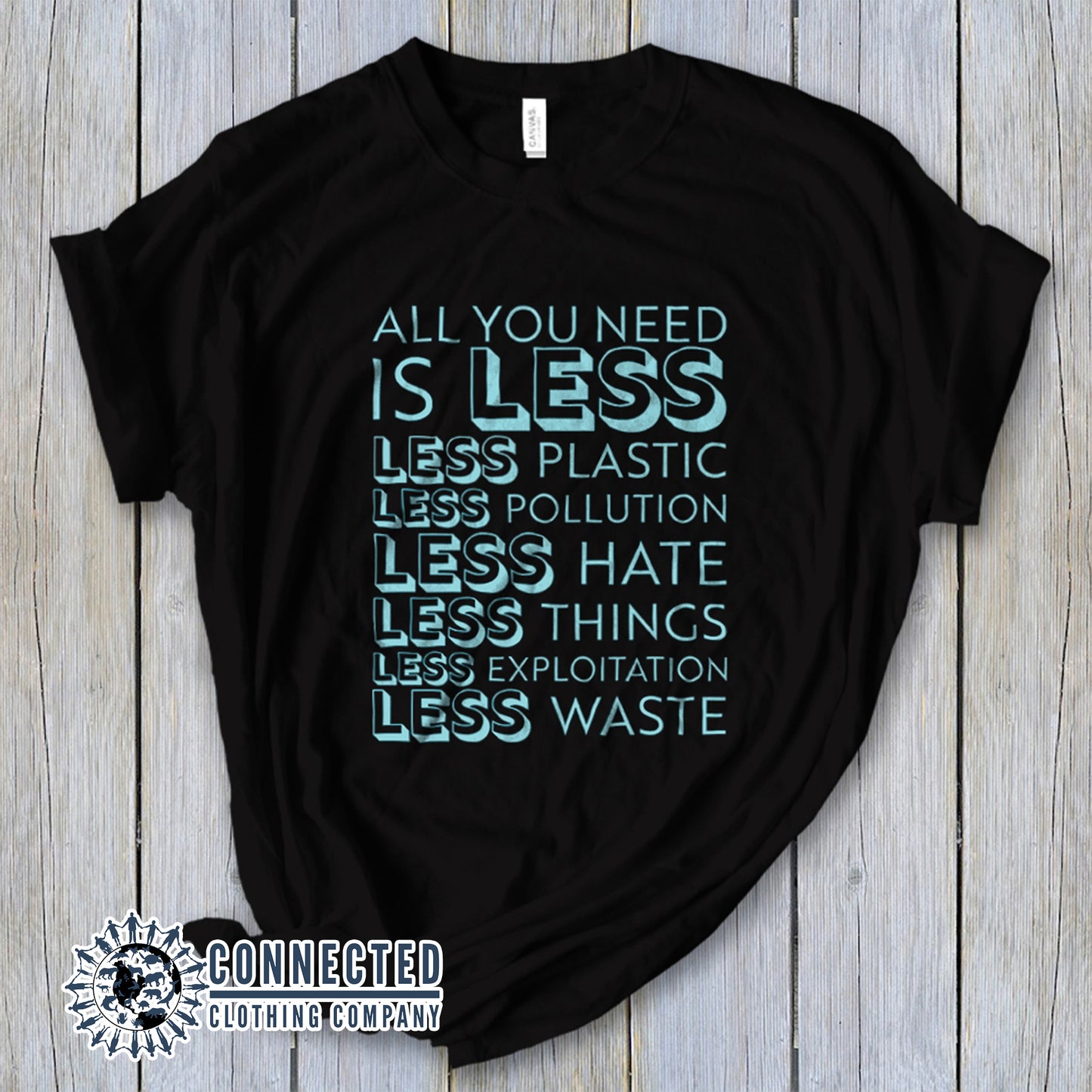 Black All You Need Is Less Short-Sleeve Unisex Tee reads "all you need is less. less plastic. less pollution. less hate. less things. less exploitation. less waste." - Connected Clothing Company - Ethically and Sustainably Made - 10% of profits donated to Mission Blue ocean conservation