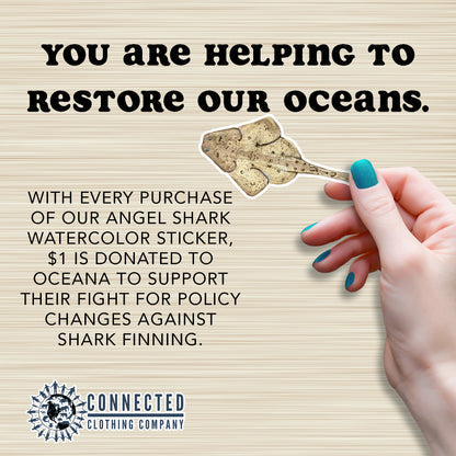 Hand Holding Angel Shark Watercolor Sticker - "You are helping to restore our oceans. With every purchase of our angel shark watercolor sticker, $1 is donated to oceana to support their fight for policy changes against shark finning." - Connected Clothing Company - Ethical and Sustainable Apparel - portion of profits donated to shark conservation
