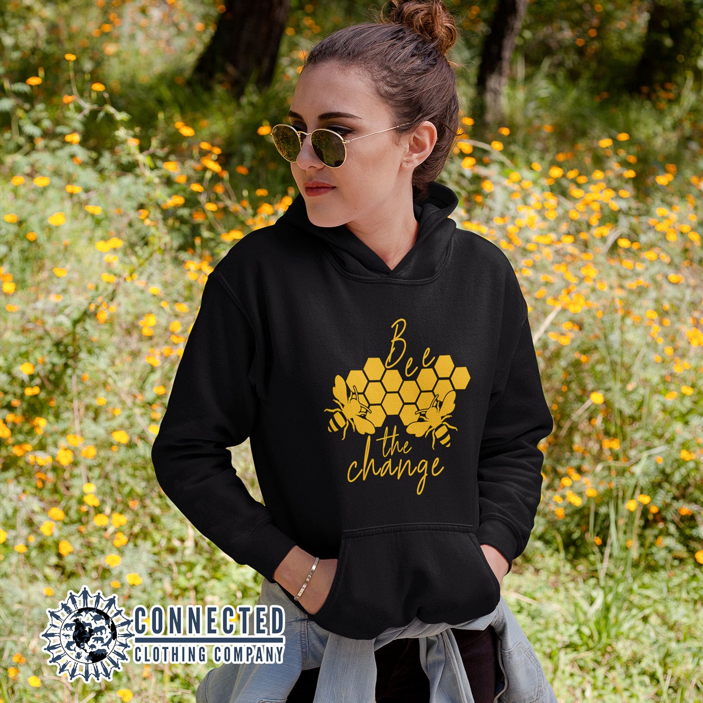 Model Wearing Black Bee The Change Unisex Hoodie - Connected Clothing Company - Ethically and Sustainably Made - 10% donated to The Honeybee Conservancy