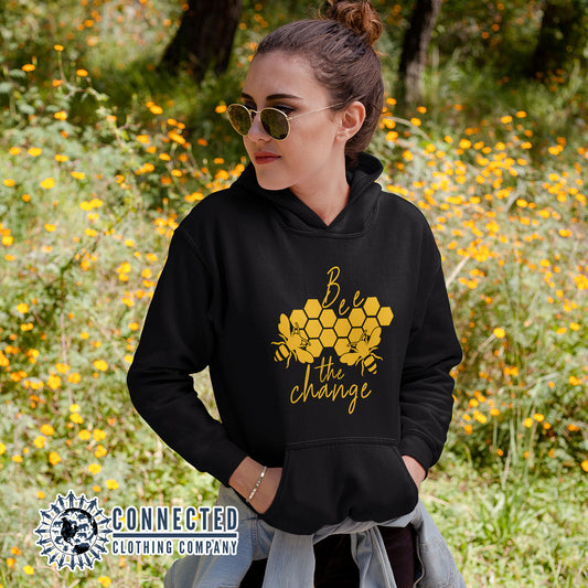 Model Wearing Black Bee The Change Unisex Hoodie - Connected Clothing Company - Ethically and Sustainably Made - 10% donated to The Honeybee Conservancy