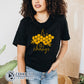 Model Wearing Black Bee The Change Unisex Short-Sleeve Tee - Connected Clothing Company - 10% of profits donated to the Honeybee Conservancy