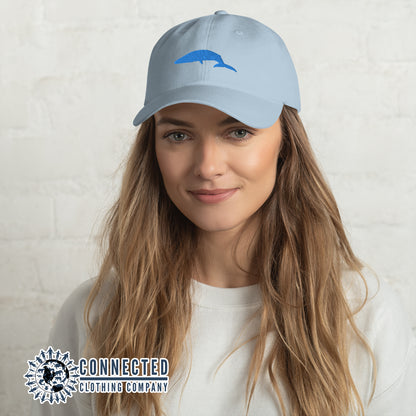Model Wearing Blue Blue Whale Cotton Cap - Connected Clothing Company - 10% of profits donated to Mission Blue ocean conservation
