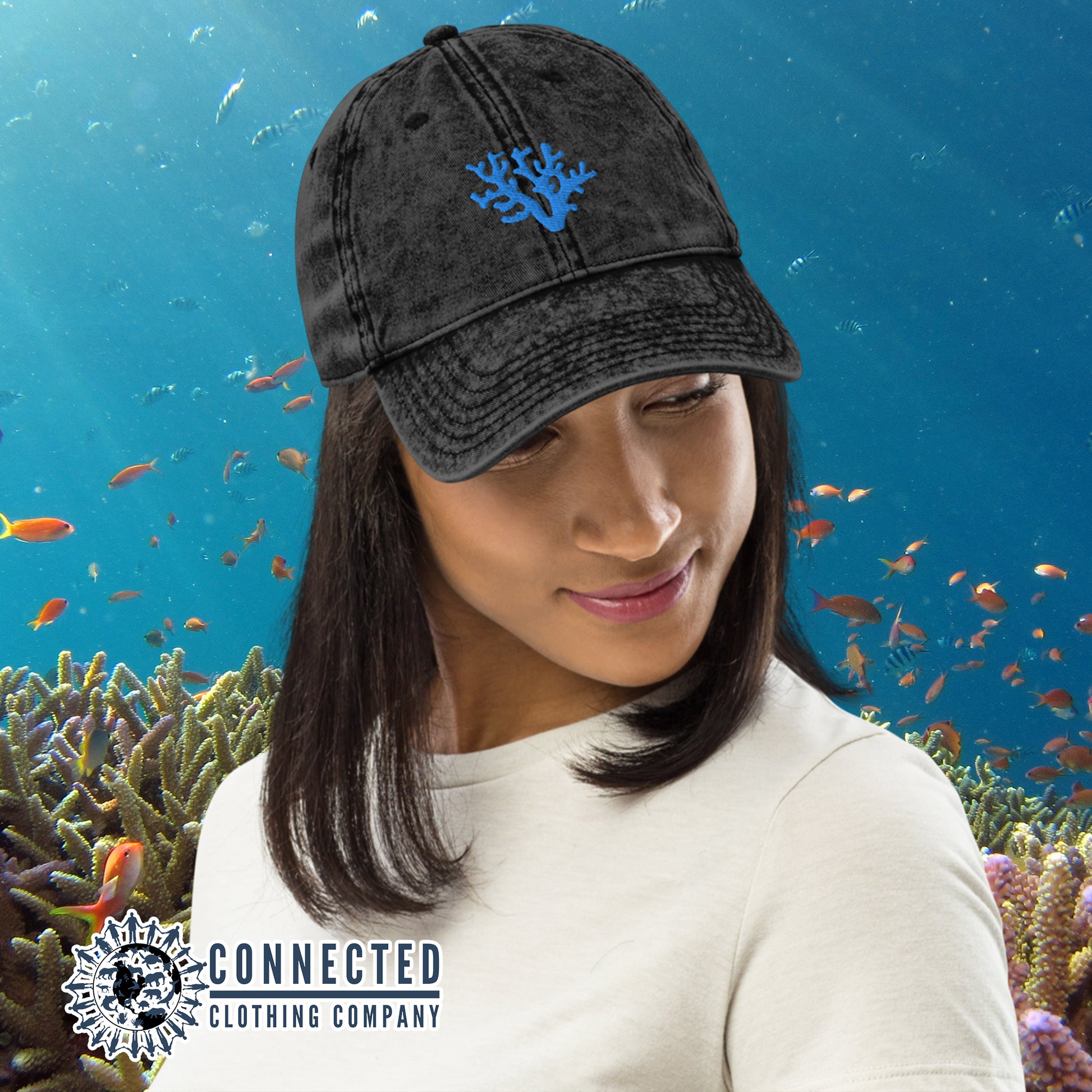 Model Wearing Black Coral Vintage Cotton Cap - Connected Clothing Company - Ethically and Sustainably Made - 10% donated to Mission Blue ocean conservation