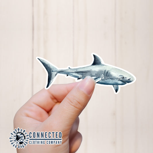 Hand Holding Great White Shark Watercolor Sticker - Connected Clothing Company - Ethical and Sustainable Apparel - portion of profits donated to shark conservation