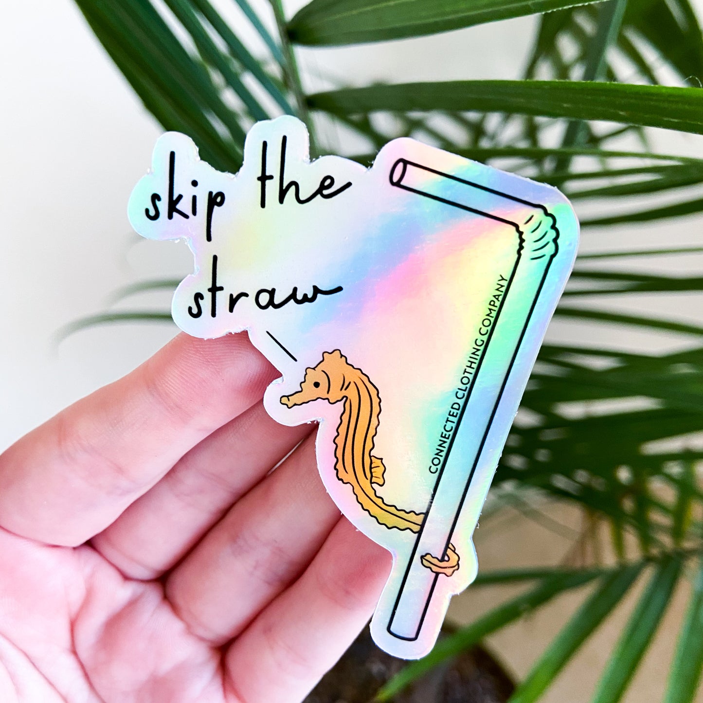 Holographic Skip The Straw Seahorse Sticker (Seahorse holding onto straw while saying skip the straw) - Connected Clothing Company - Ethically and Sustainably Made - $1 donated to Mission Blue ocean conservation