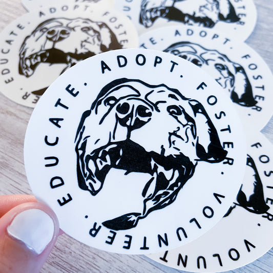 Close up of Adopt Educate Foster Volunteer Sticker - Connected Clothing Company - 10% of profits donated to SPCA animal rescue
