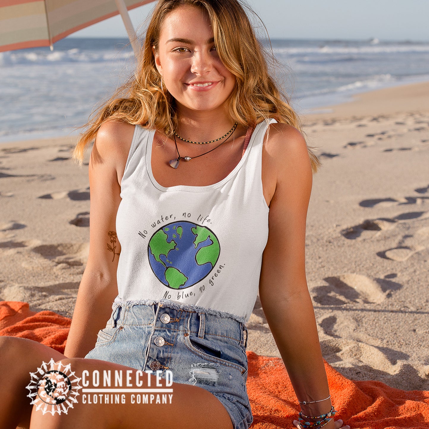 Model Wearing White No Blue No Green Women's Relaxed Tank - Connected Clothing Company - Ethically and Sustainably Made - 10% of profits donated to Mission Blue ocean conservation