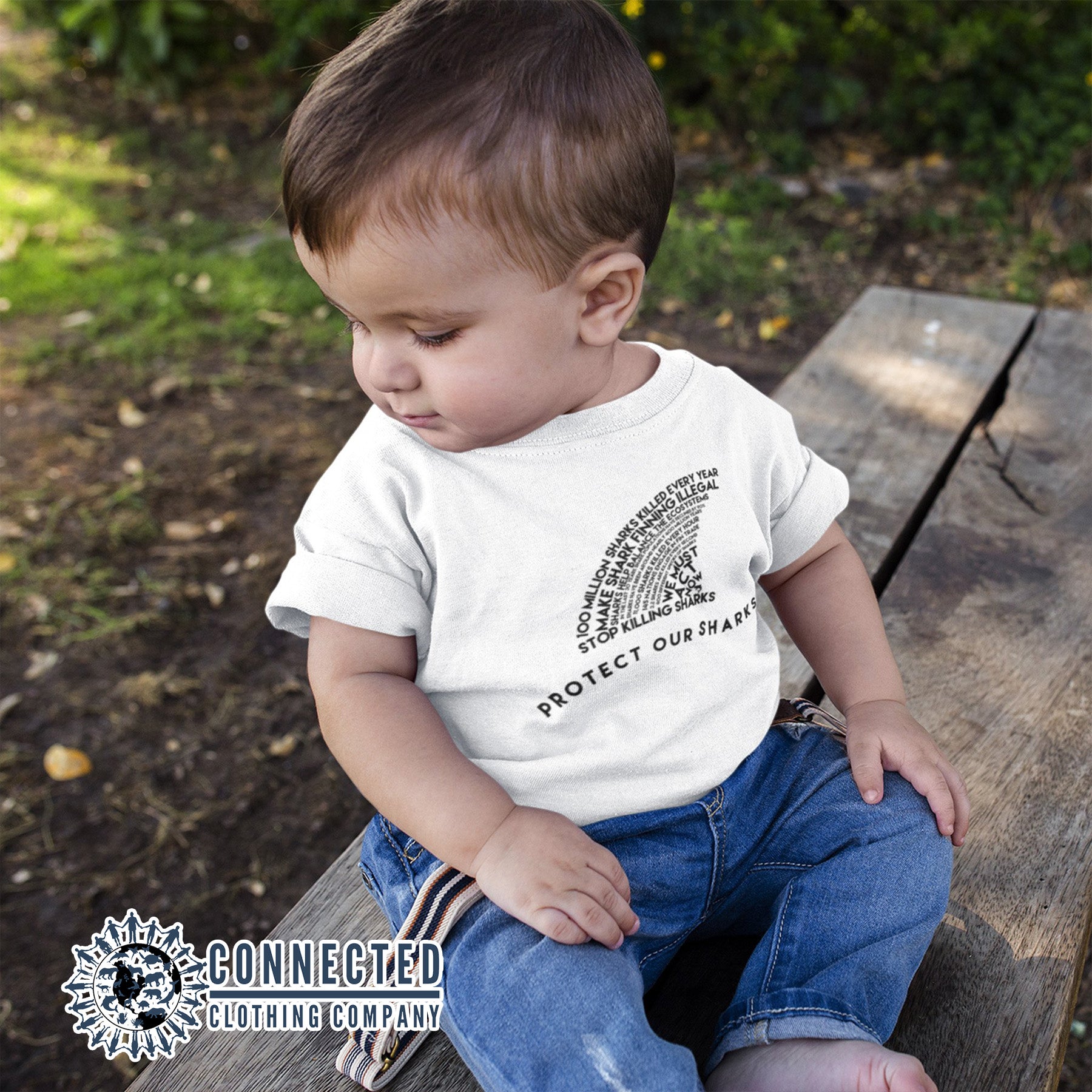 Toddler Model Wearing White Protect Our Sharks Toddler Short-Sleeve Tee - Connected Clothing Company - 10% of profits donated to Oceana shark conservation
