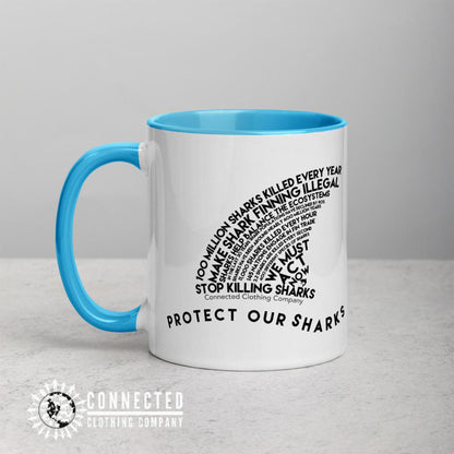 Right Side of Protect Our Sharks Mug With Blue Coloring on Inside, Rim, and Handle - Connected Clothing Company - Ethically and Sustainably Made - 10% donated to Oceana shark conservation