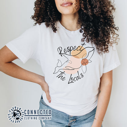 Model Wearing White Respect The Locals Orca Unisex Short-Sleeve Tee - Connected Clothing Company - Ethically and Sustainably Made - 10% of profits donated to orca conservation