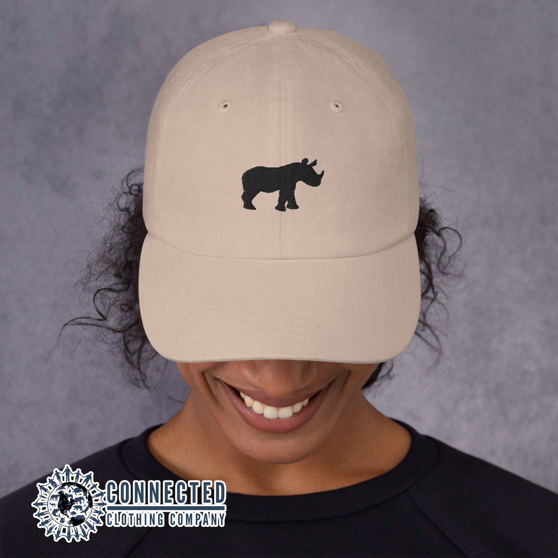 Model Wearing Stone Rhino Cotton Cap - Connected Clothing Company - 10% of profits donated to Save The Rhino conservation