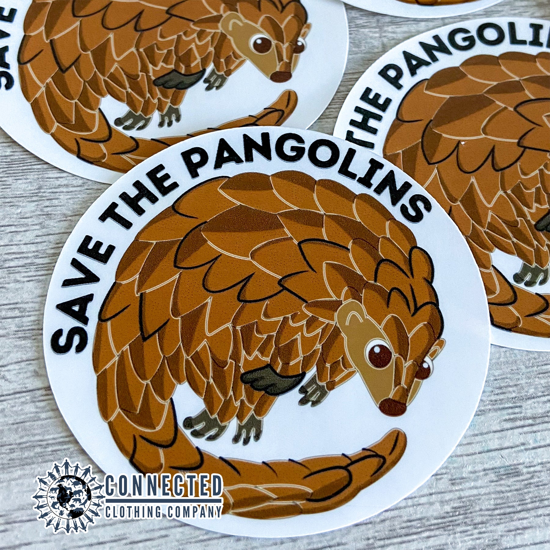 Close up of Save The Pangolins Sticker - Connected Clothing Company -  portion of profits donated to save the pangolins