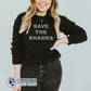 Model Wearing Black Save The Sharks Unisex Crewneck Sweatshirt - Connected Clothing Company - Ethically and Sustainably Made - 10% of profits donated to shark conservation and ocean conservation