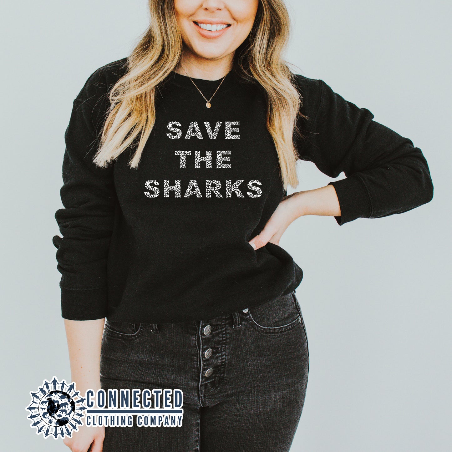 Model Wearing Black Save The Sharks Unisex Crewneck Sweatshirt - Connected Clothing Company - Ethically and Sustainably Made - 10% of profits donated to shark conservation and ocean conservation