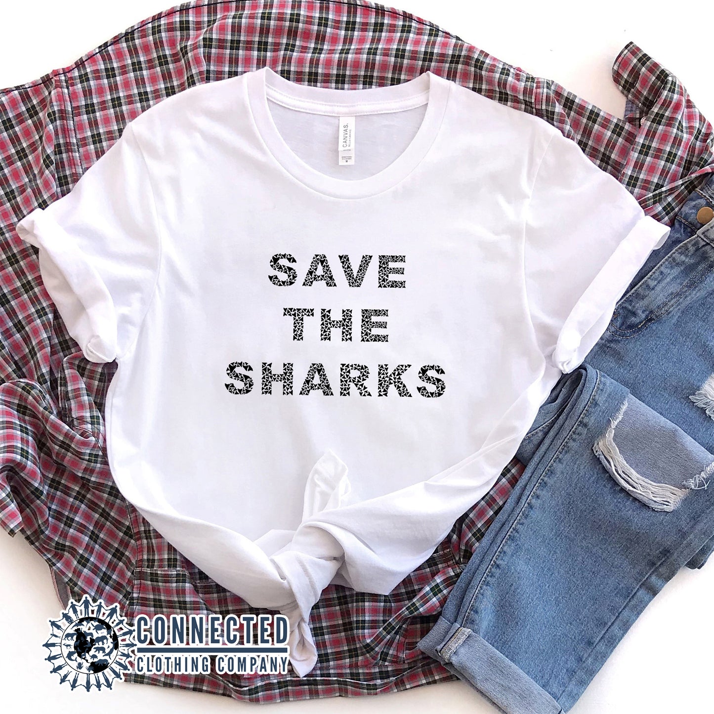 White Save The Sharks Short-Sleeve Unisex T-Shirt reads "Save The Sharks." - Connected Clothing Company - Ethically and Sustainably Made - 10% donated to Oceana shark conservation
