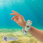 Sea Turtle Scrunchie On A Wrist - Connected Clothing Company - Ethical & Sustainable Apparel - 10% donated to save the sea turtles