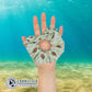 Hand Holding Sea Turtle Scrunchie - Connected Clothing Company - Ethical & Sustainable Apparel - 10% donated to save the sea turtles