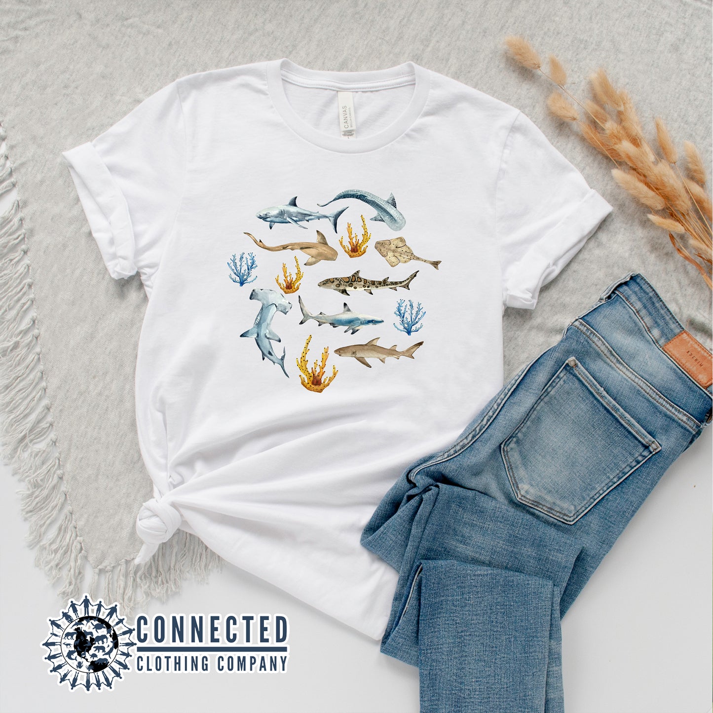 Flatlay of White Shark Ocean Watercolor Unisex Short-Sleeve Tshirt - Connected Clothing Company - Ethically and Sustainably Made - 10% of profits donated to shark conservation and ocean conservation
