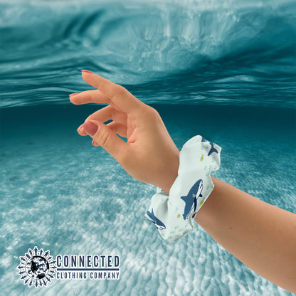 Wrist Holding Shark Scrunchie in Light Color - Connected Clothing Company - Ethical & Sustainable Apparel - 10% donated to save the sharks