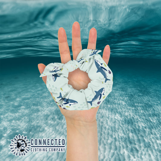Hand Holding Shark Scrunchie in Light Color - Connected Clothing Company - Ethical & Sustainable Apparel - 10% donated to save the sharks